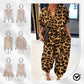 Kvinnors avslappnade lösa jumpsuit med kort ärm och knappar