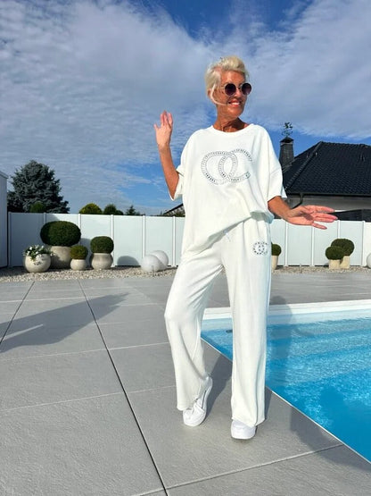 ⏳Begränsat erbjudande! ⏰Casual tvådelat set för kvinnor, enfärgad topp och lösa byxor