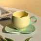 Keramisk kaffekopp med fat